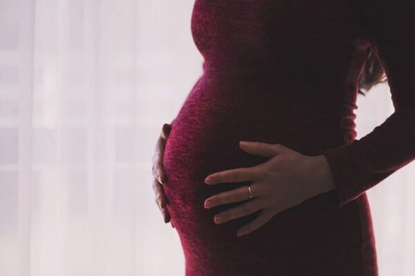 Can we combine three insurance policies to claim maternity expenses?