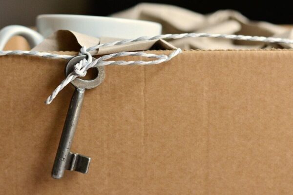 How will my property sale be taxed after I relocate to India?