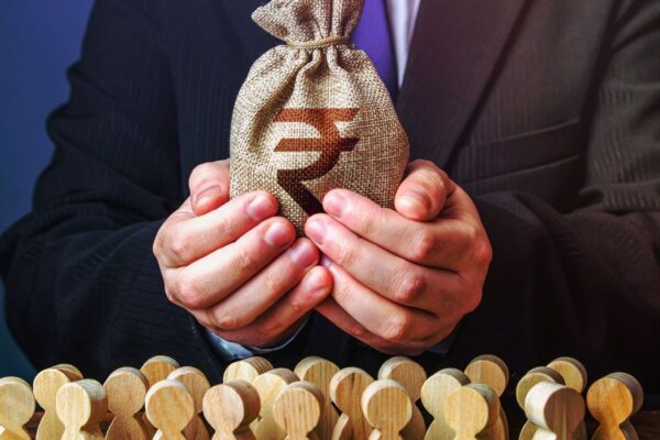 What will be the tax on the sale of shares bought as a resident and NRI?